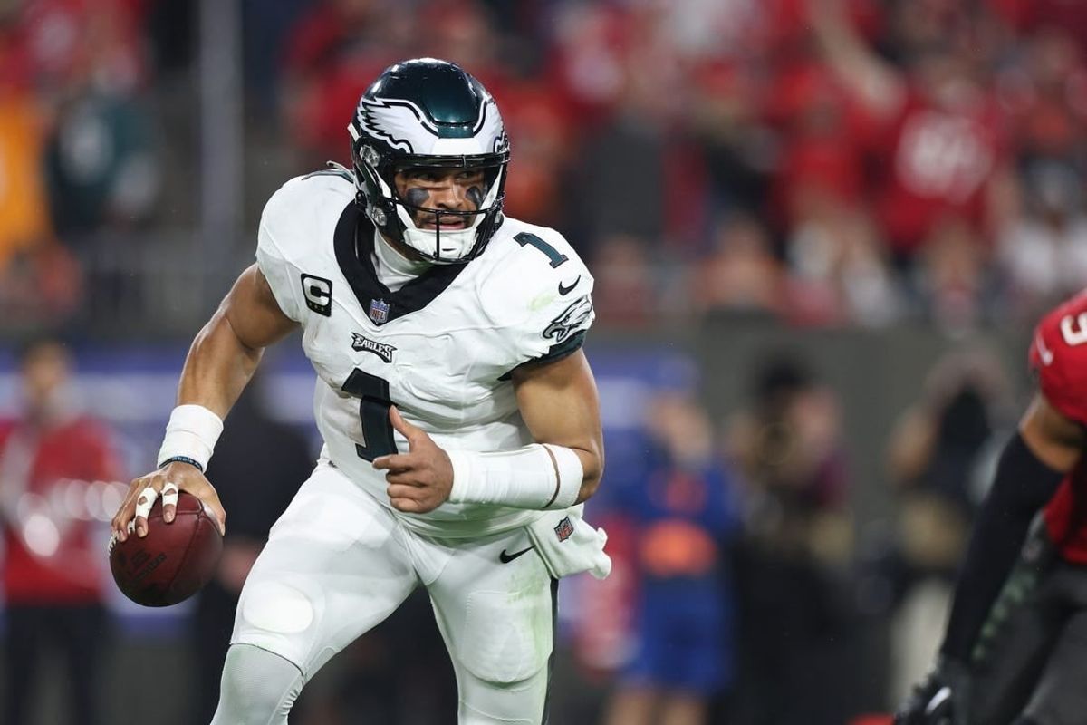 Jan 15, 2024; Tampa, Florida, USA; Philadelphia Eagles quarterback Jalen Hurts (1) runs with the ball during the second half of a 2024 NFC wild card game against the Tampa Bay Buccaneers at Raymond James Stadium.