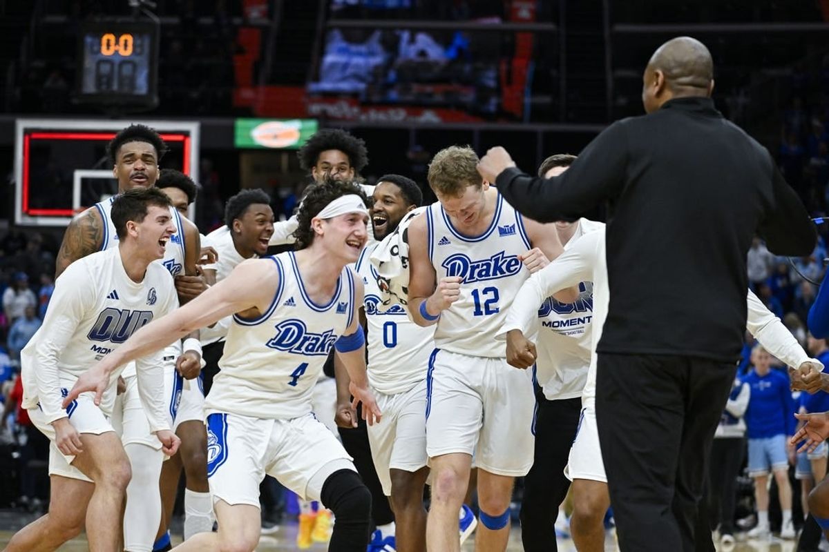 Mar 10, 2024; St. Louis, MO, USA;  Drake Bulldogs celebrate after defeating the Indiana State Sycamores to win the Missouri Valley Conference Tournament Championship at Enterprise Center.