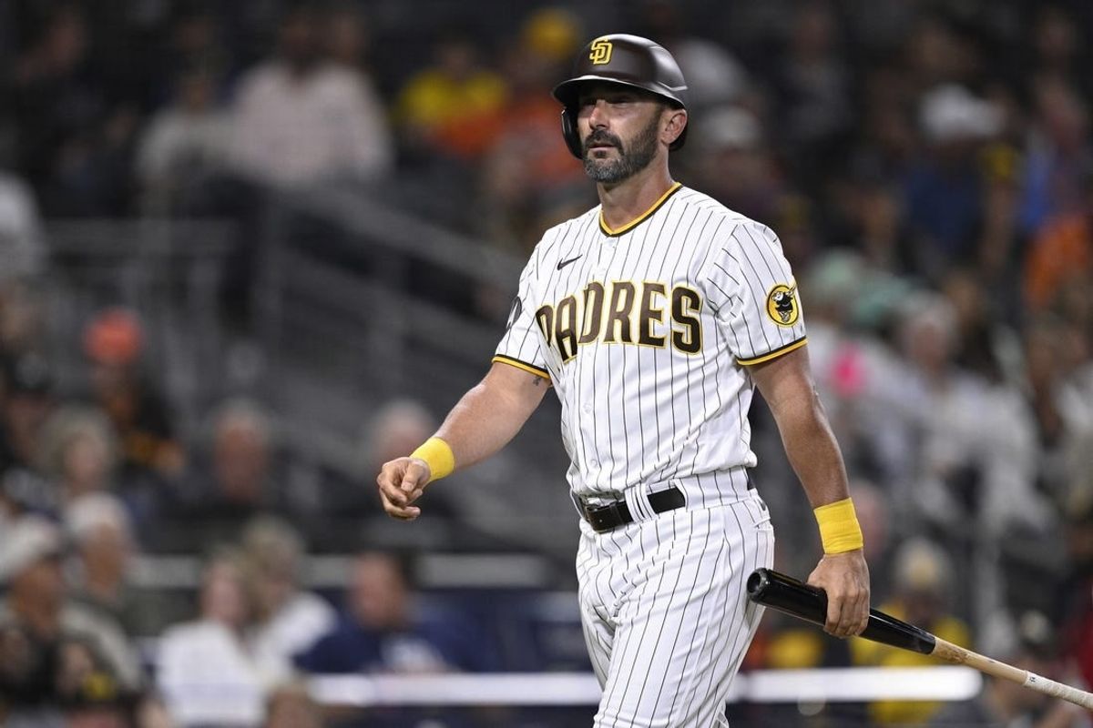 Aug 15, 2023; San Diego, California, USA; San Diego Padres pinch hitter Matt Carpenter (14) walks to the dugout after striking out during the seventh inning against the Baltimore Orioles at Petco Park.