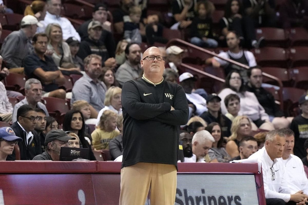 Nov 19, 2023; Charleston, SC, USA; Wake Forest Demon Deacons head coach Steve Forbes watches the action in the first half against the LSU Tigers at TD Arena.