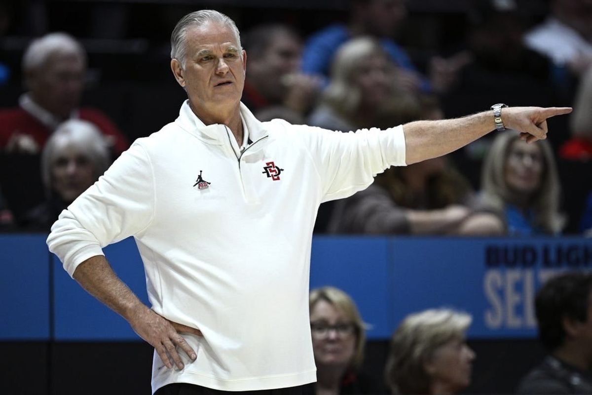 Nov 14, 2023; San Diego, California, USA; San Diego State Aztecs head coach Brian Dutcher gestures from the sideline against the Long Beach State 49ers during the second half at Viejas Arena.