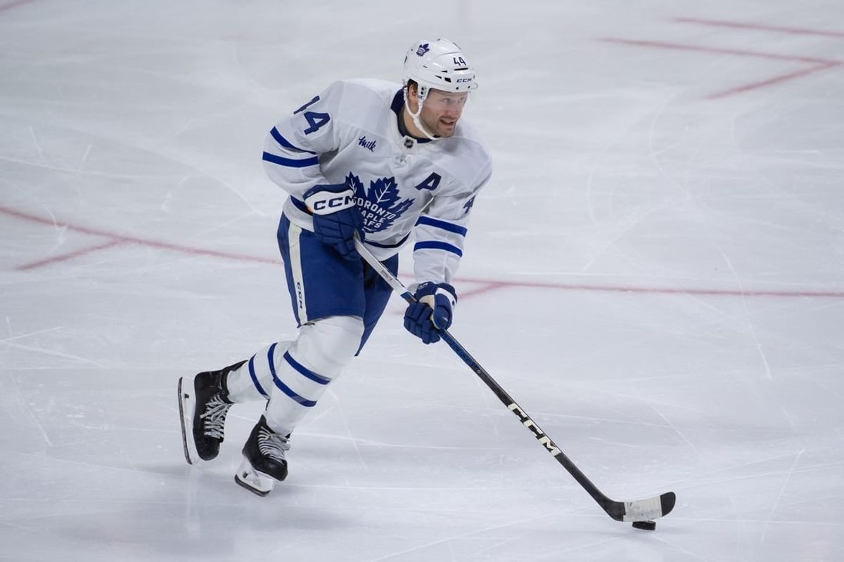 Feb 10, 2024; Ottawa, Ontario, CAN; Toronto Maple Leafs defenseman Morgan Rielly (44) skates with the puck in the third period against the Ottawa Senators at the Canadian Tire Centre.