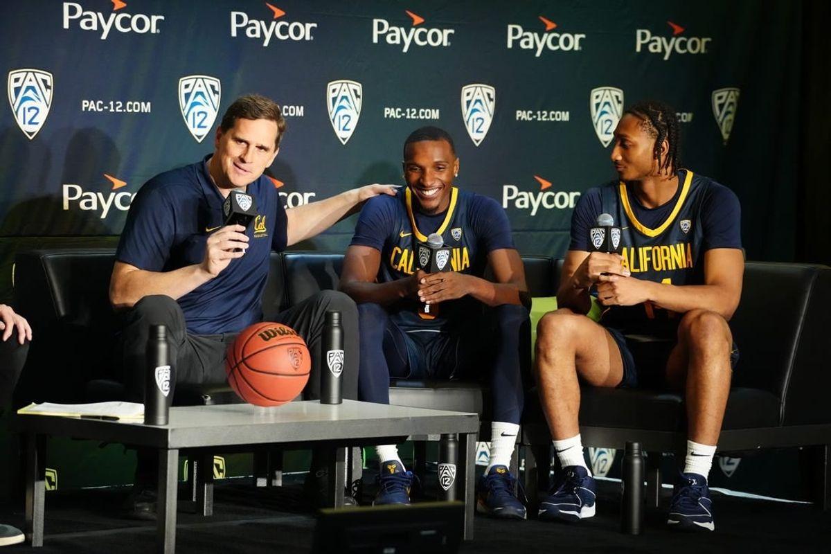 Oct 11, 2023; Las Vegas, NV, USA; California Golden Bears coach Mark Madsen (left), guard Keonte Kennedy (3) and forward Grant Newell (14) during Pac-12 Media Day at Park MGM Las Vegas Conference Center.