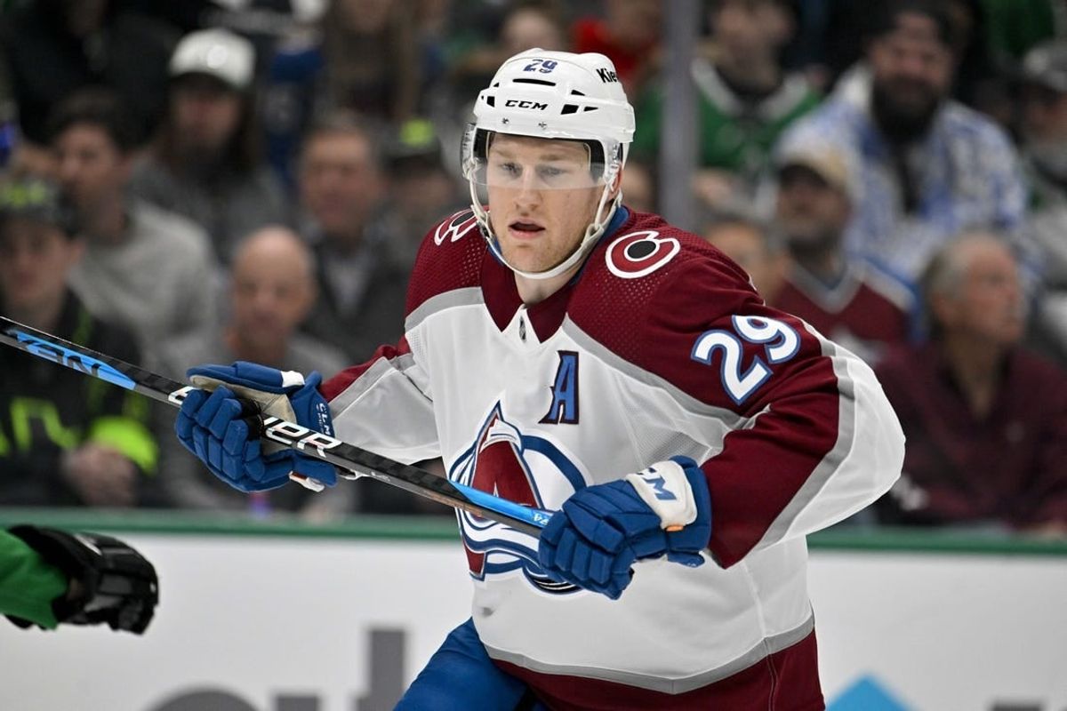 Jan 4, 2024; Dallas, Texas, USA; Colorado Avalanche center Nathan MacKinnon (29) skates against the Dallas Stars during the first period at the American Airlines Center.