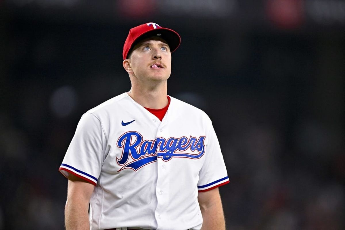 Jun 17, 2023; Arlington, Texas, USA; Texas Rangers relief pitcher Josh Sborz (66) walks off the field after pitching against the Toronto Blue Jays at Globe Life Field.