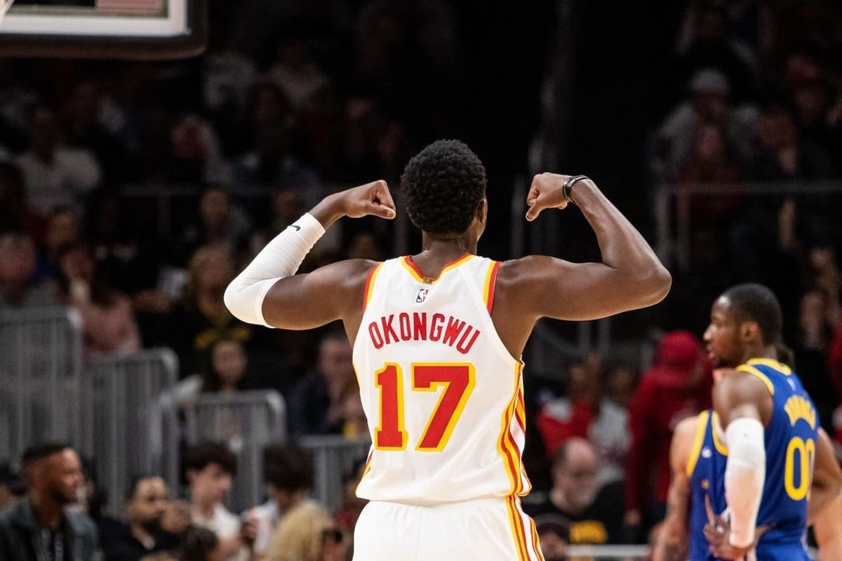 Feb 3, 2024; Atlanta, Georgia, USA; Atlanta Hawks forward Onyeka Okongwu (17) celebrates shot against Golden State Warriors during the third quarter at State Farm Arena.