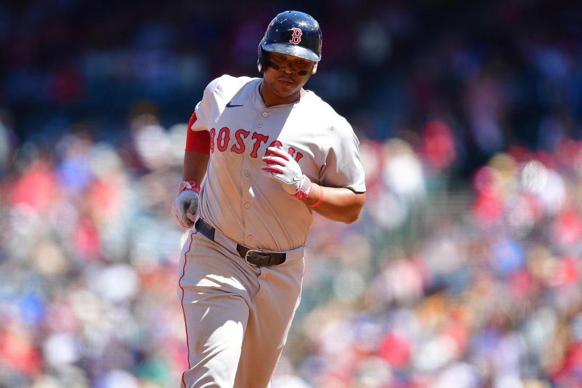 Apr 7, 2024; Anaheim, California, USA; Boston Red Sox third base Rafael Devers (11) rounds the bases after hitting a solo home run against the Los Angeles Angels during the third inning at Angel Stadium.