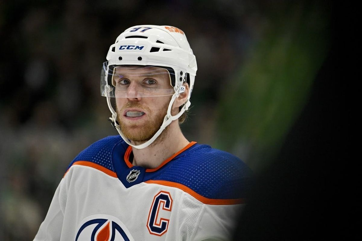Apr 3, 2024; Dallas, Texas, USA; Edmonton Oilers center Connor McDavid (97) looks on before the face-off against the Dallas Stars during the third period at the American Airlines Center.
