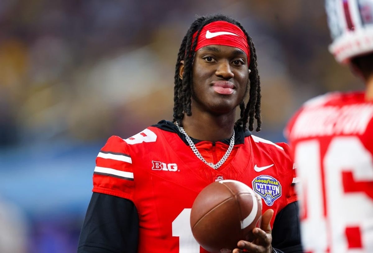 Dec 29, 2023; Arlington, TX, USA;  Ohio State Buckeyes wide receiver Marvin Harrison Jr. (18) looks on during the second half against the Missouri Tigers at AT&T Stadium.