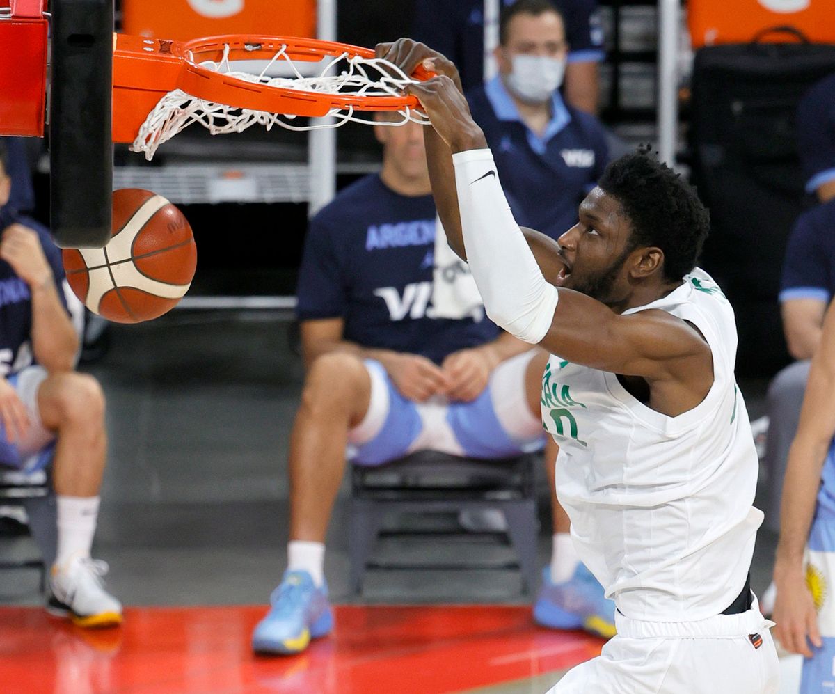 Chimezie Metu of Nigeria dunks in an exhibition against Argentina.