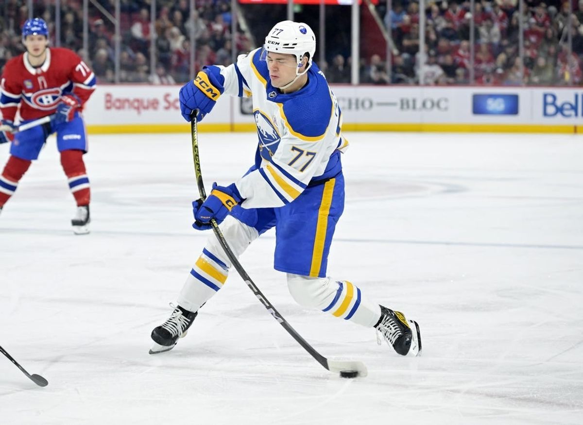 Jan 4, 2024; Montreal, Quebec, CAN; Buffalo Sabres forward JJ Peterka (77) takes a shot on the Montreal Canadiens net during the first period at the Bell Centre.