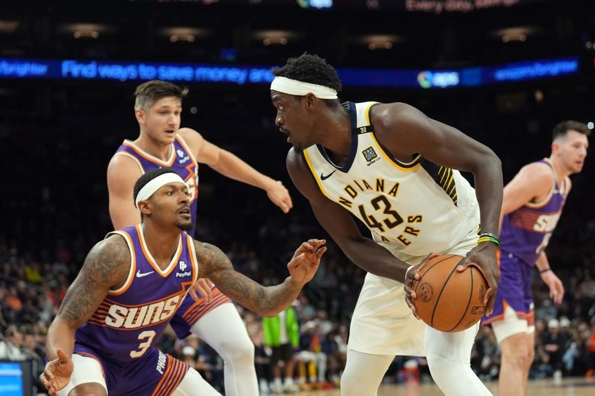 Jan 21, 2024; Phoenix, Arizona, USA; Phoenix Suns guard Bradley Beal (3) guards Indiana Pacers forward Pascal Siakam (43) during the second half at Footprint Center.