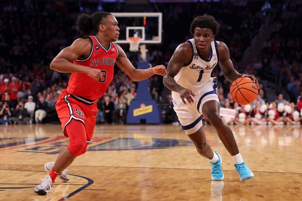 Mar 14, 2024; New York City, NY, USA; Seton Hall Pirates guard Kadary Richmond (1) drives to the basket against St. John's Red Storm guard Jordan Dingle (3) during the second half at Madison Square Garden.
