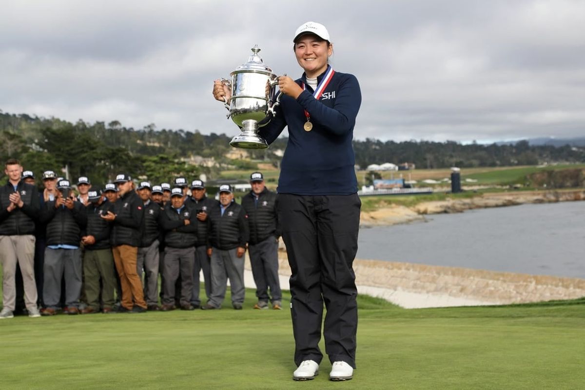 Jul 9, 2023; Pebble Beach, California, USA; Allisen Corpuz celebrates with the Harton S. Semple Trophy after winning the U.S. Women's Open golf tournament at Pebble Beach Golf Link.