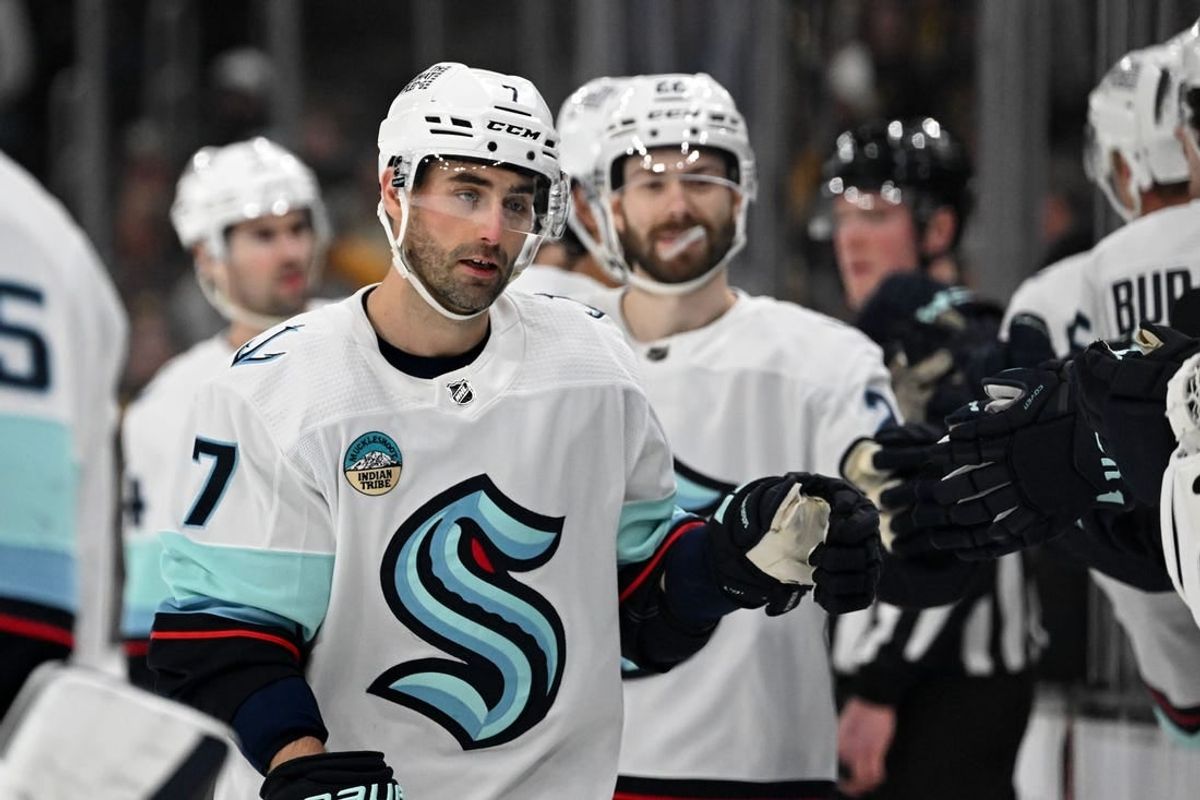 Feb 15, 2024; Boston, Massachusetts, USA; Seattle Kraken right wing Jordan Eberle (7) celebrates with his teammates after scoring a goal against the Boston Bruins during the first period at TD Garden.