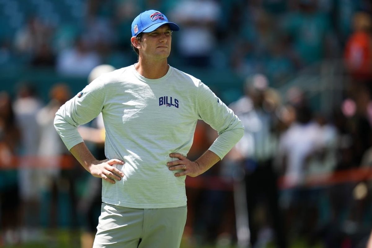 Sep 25, 2022; Miami Gardens, Florida, USA; Buffalo Bills offensive coordinator Ken Dorsey stands on the field prior to the game between the Miami Dolphins and the Buffalo Bills at Hard Rock Stadium.