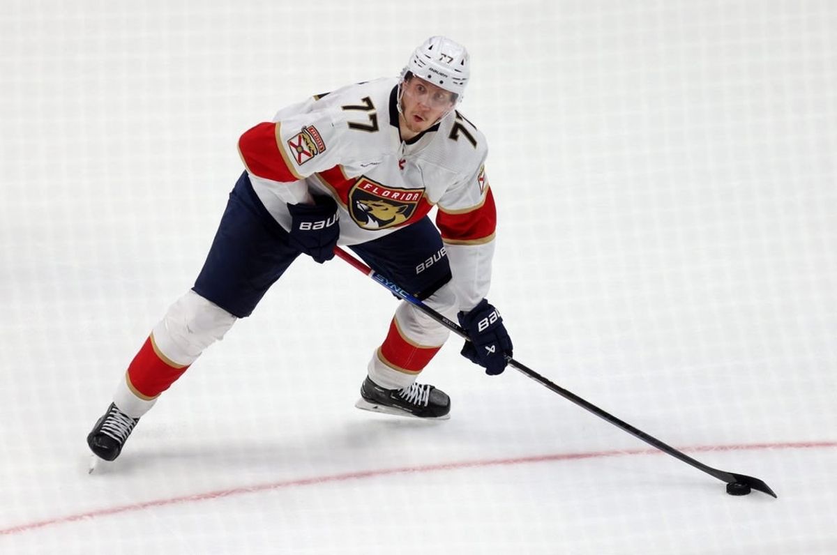Nov 17, 2023; Anaheim, California, USA; Florida Panthers defenseman Niko Mikkola (77) shoots during the second period against the Anaheim Ducks at Honda Center.