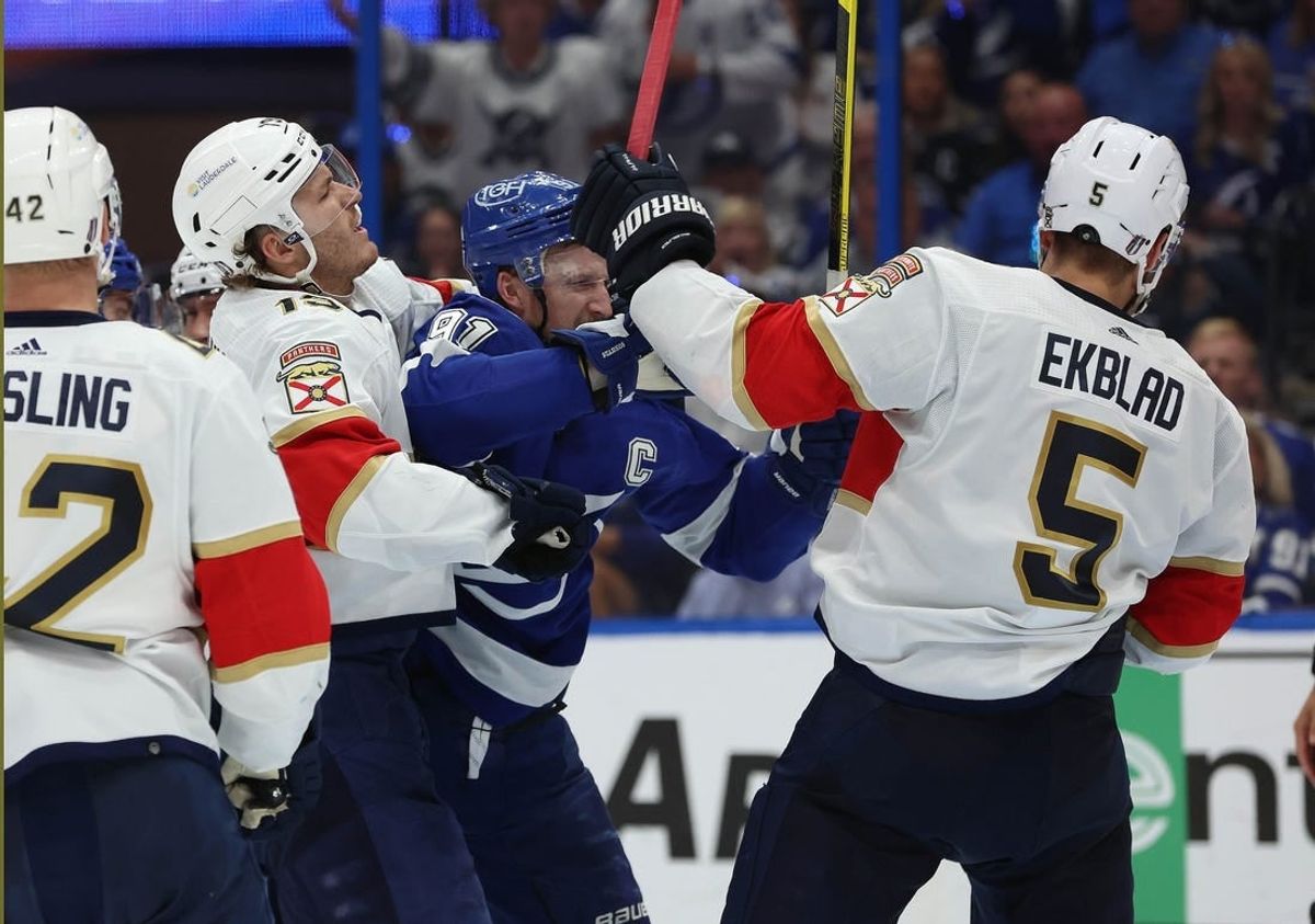 Apr 27, 2024; Tampa, Florida, USA; Tampa Bay Lightning center Steven Stamkos (91), Florida Panthers defenseman Aaron Ekblad (5) and Florida Panthers left wing Matthew Tkachuk (19) defend during the third period in game four of the first round of the 2024 Stanley Cup Playoffs at Amalie Arena.