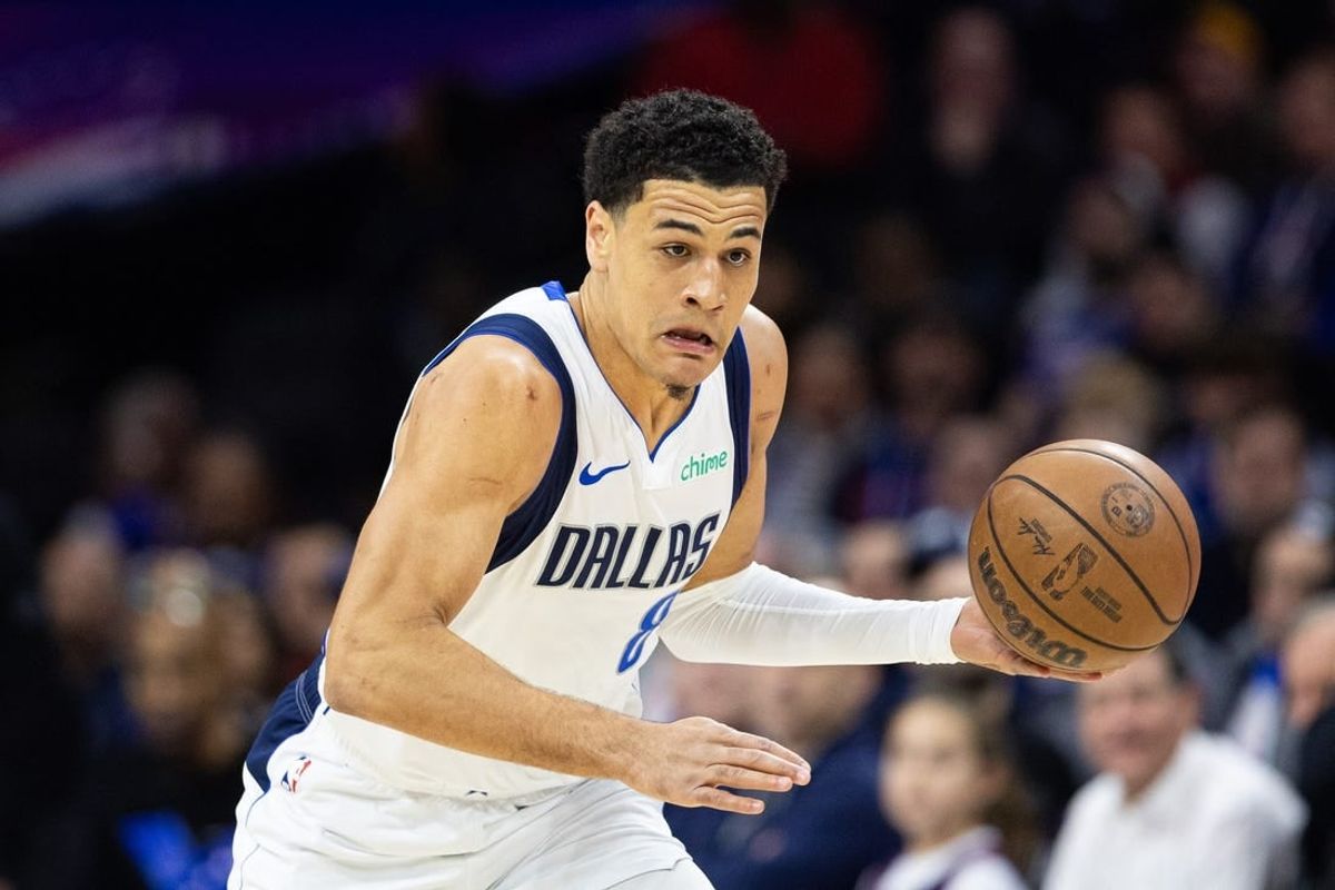 Feb 5, 2024; Philadelphia, Pennsylvania, USA; Dallas Mavericks guard Josh Green (8) dribbles the ball Philadelphia 76ers at Wells Fargo Center.