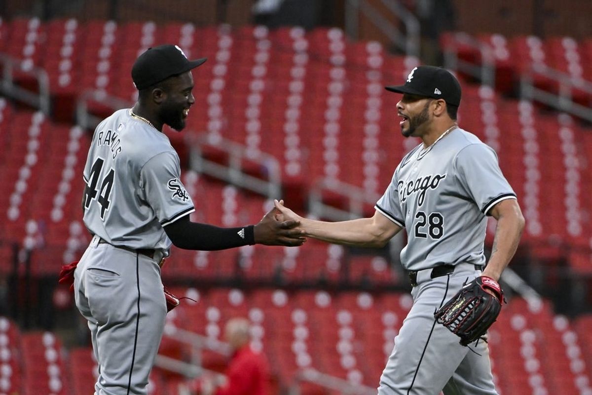 May 4, 2024; St. Louis, Missouri, USA;  Chicago White Sox third baseman Bryan Ramos (44) celebrates with right fielder Tommy Pham (28) after the White Sox defeated the St. Louis Cardinals in ten innings at Busch Stadium.