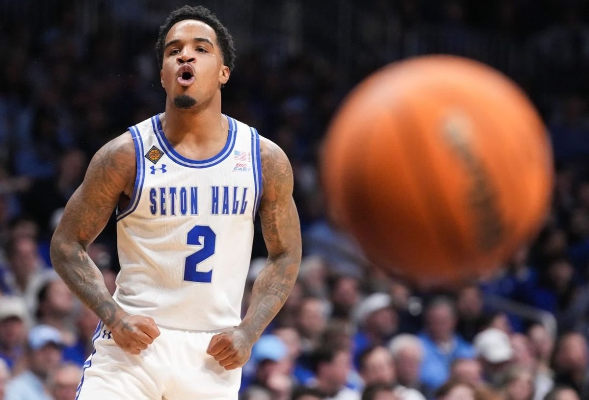 It was a title game that lived up to its billing, a showcase of two NCAA Tournament snubs that proved they belonged, waged before a relentlessly raucous crowd at historic Hinkle Fieldhouse. In the NIT final, and in the end, Seton Hall dug deep and rallied late for a 79-77 triumph Thursday, April 4, 2024. Senior wing Dre Davis hit the go-ahead layup with 16 seconds left. Pictured: Seton Hall Pirates guard Al-Amir Dawes (2) yells in excitement during the NIT championship game.