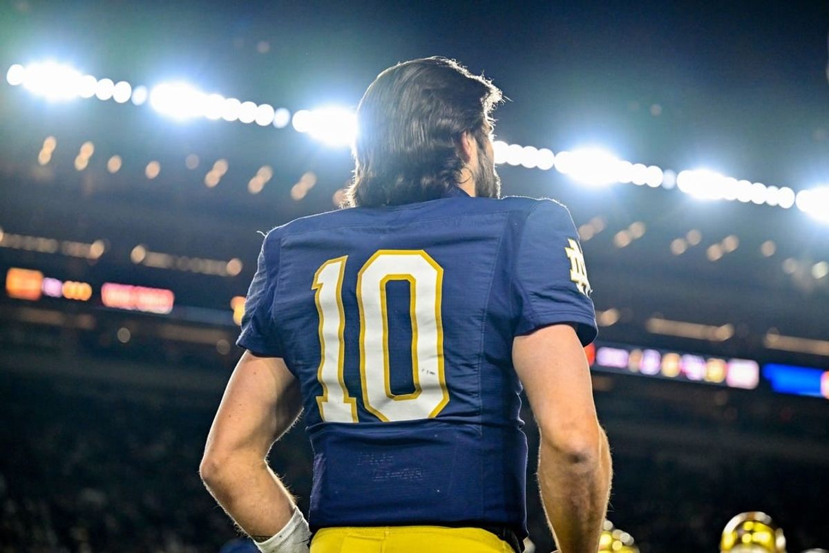 Nov 18, 2023; South Bend, Indiana, USA; Notre Dame Fighting Irish quarterback Sam Hartman (10) watches from the bench in the fourth quarter against the Wake Forest Demon Deacons at Notre Dame Stadium.