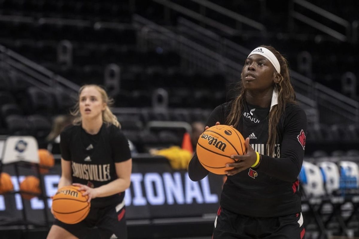Former teammates with the Louisville Cardinals, forward Olivia Cochran (44) would welcome a date with current LSU guard Hailey Van Lith on Sunday.