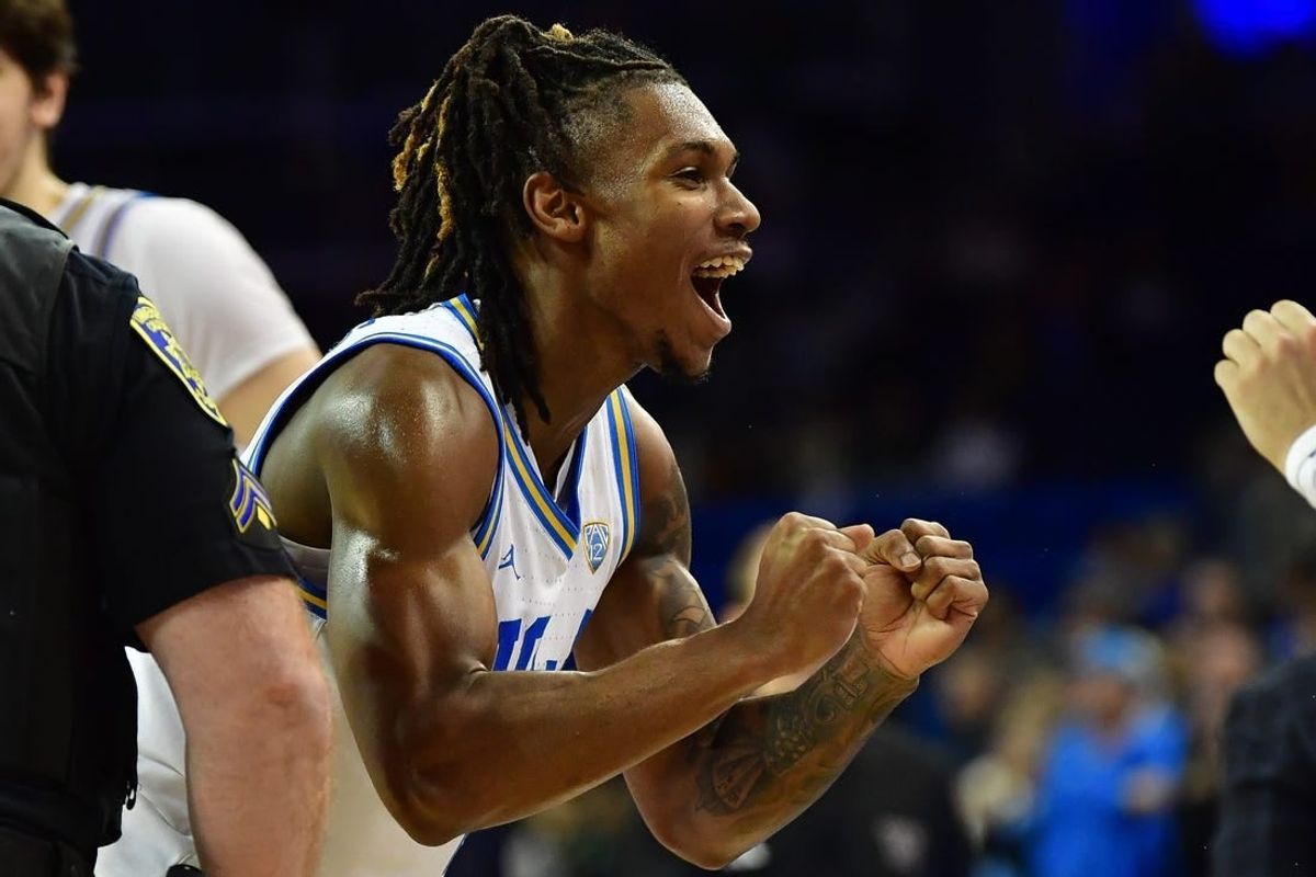 January 14, 2024; Los Angeles, California, USA; UCLA Bruins guard Dylan Andrews (2) celebrates the victory against the Washington Huskies at Pauley Pavilion.