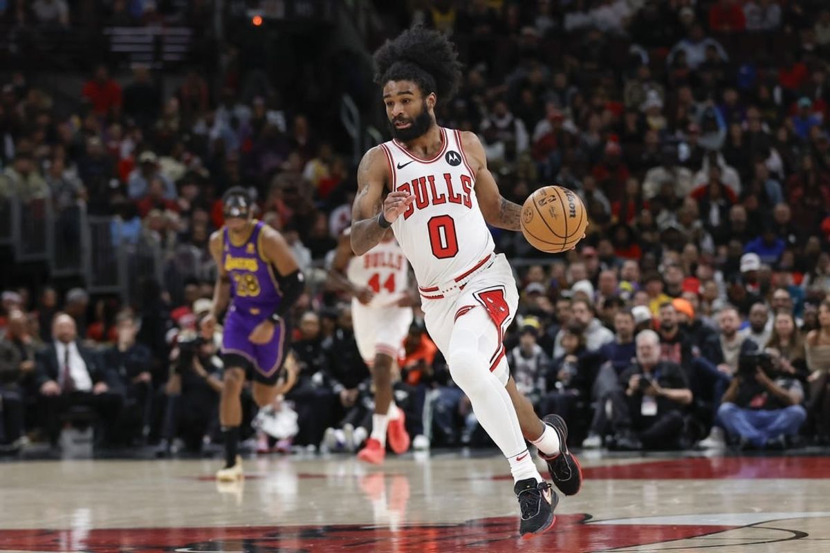 Dec 20, 2023; Chicago, Illinois, USA; Chicago Bulls guard Coby White (0) brings the ball up court against the Los Angeles Lakers during the first half at United Center.