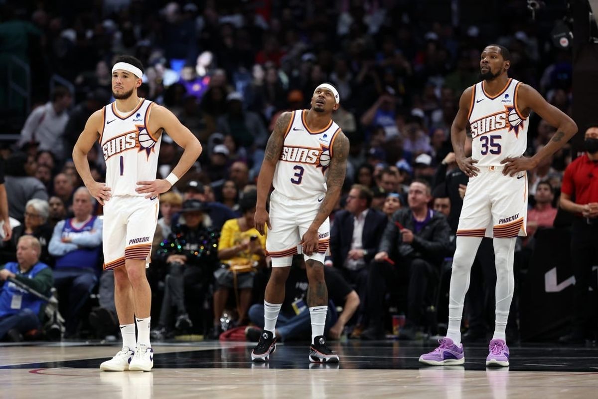 Jan 8, 2024; Los Angeles, California, USA;  Phoenix Suns guard Devin Booker (1) and guard Bradley Beal (3) and forward Kevin Durant (35) stands on the floor during the fourth quarter against the Los Angeles Clippers at Crypto.com Arena.