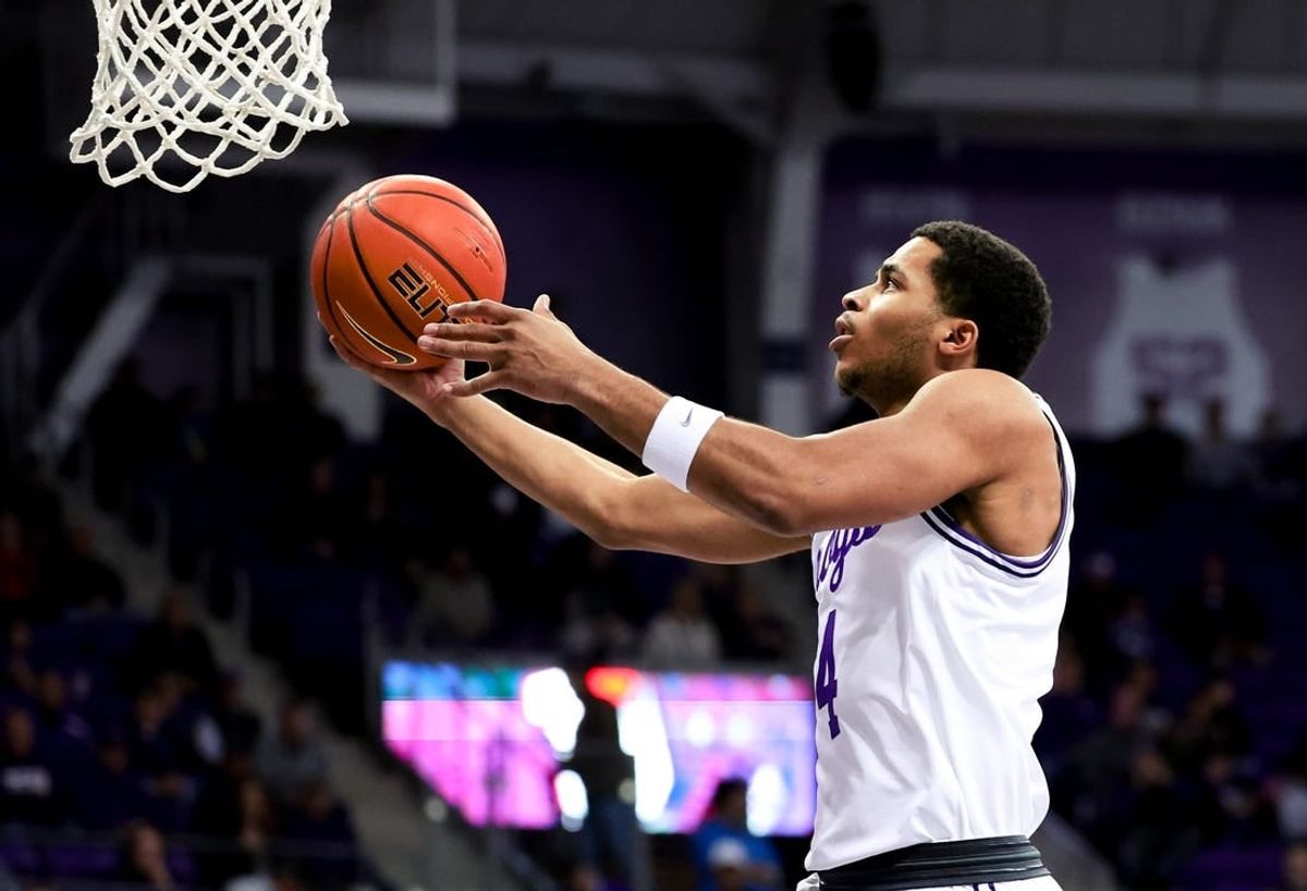 Feb 12, 2024; Fort Worth, Texas, USA;  TCU Horned Frogs guard Jameer Nelson Jr. (4) shoots during the first half against the West Virginia Mountaineers at Ed and Rae Schollmaier Arena.