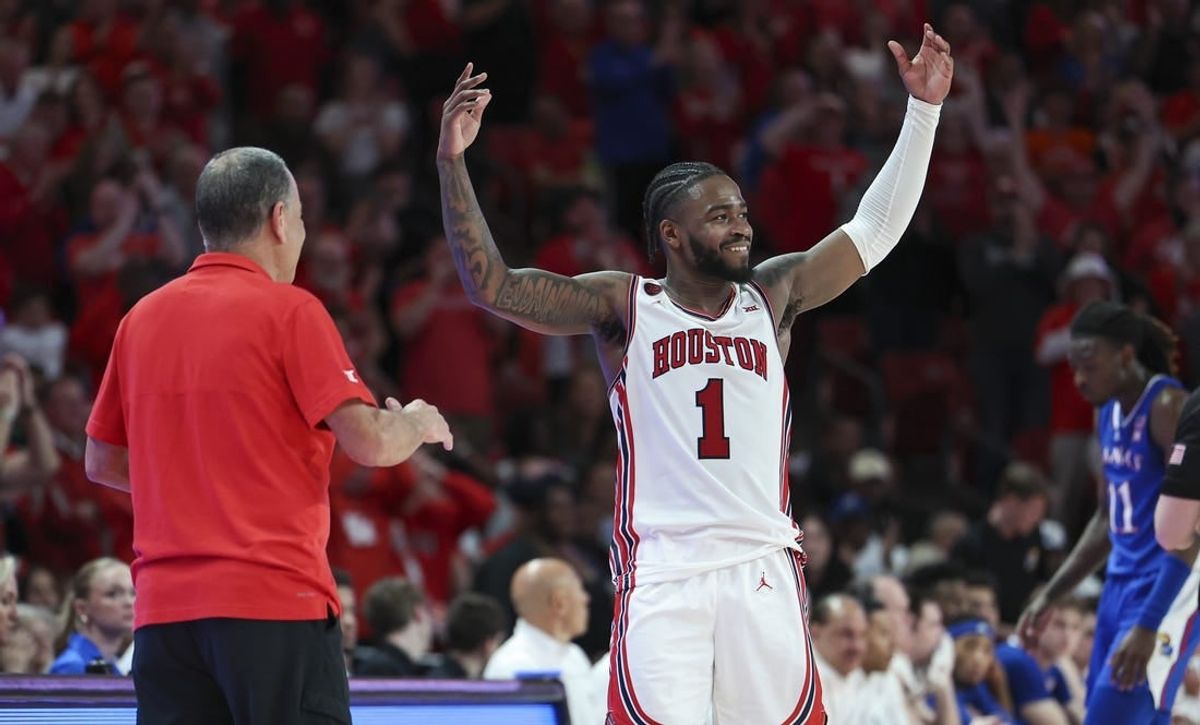 Mar 9, 2024; Houston, Texas, USA; Houston Cougars guard Jamal Shead (1) acknowledges the crowd after coming out of the game during the second half against the Kansas Jayhawks at Fertitta Center.