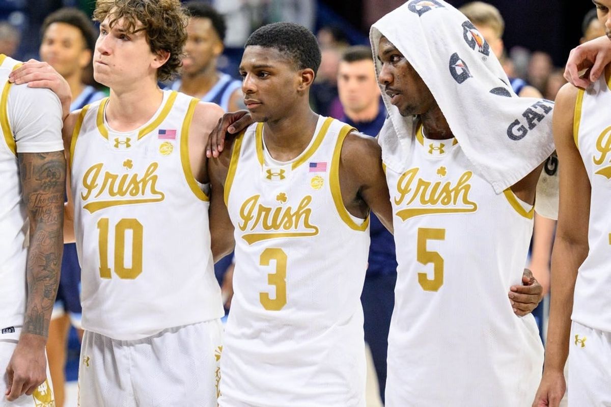 Dec 19, 2023; South Bend, Indiana, USA; Notre Dame Fighting Irish guard Raheem Braiton (5) consoles guard Markus Burton (3) after Notre Dame lost to the Citadel Bulldogs 65-45 at the Purcell Pavilion.