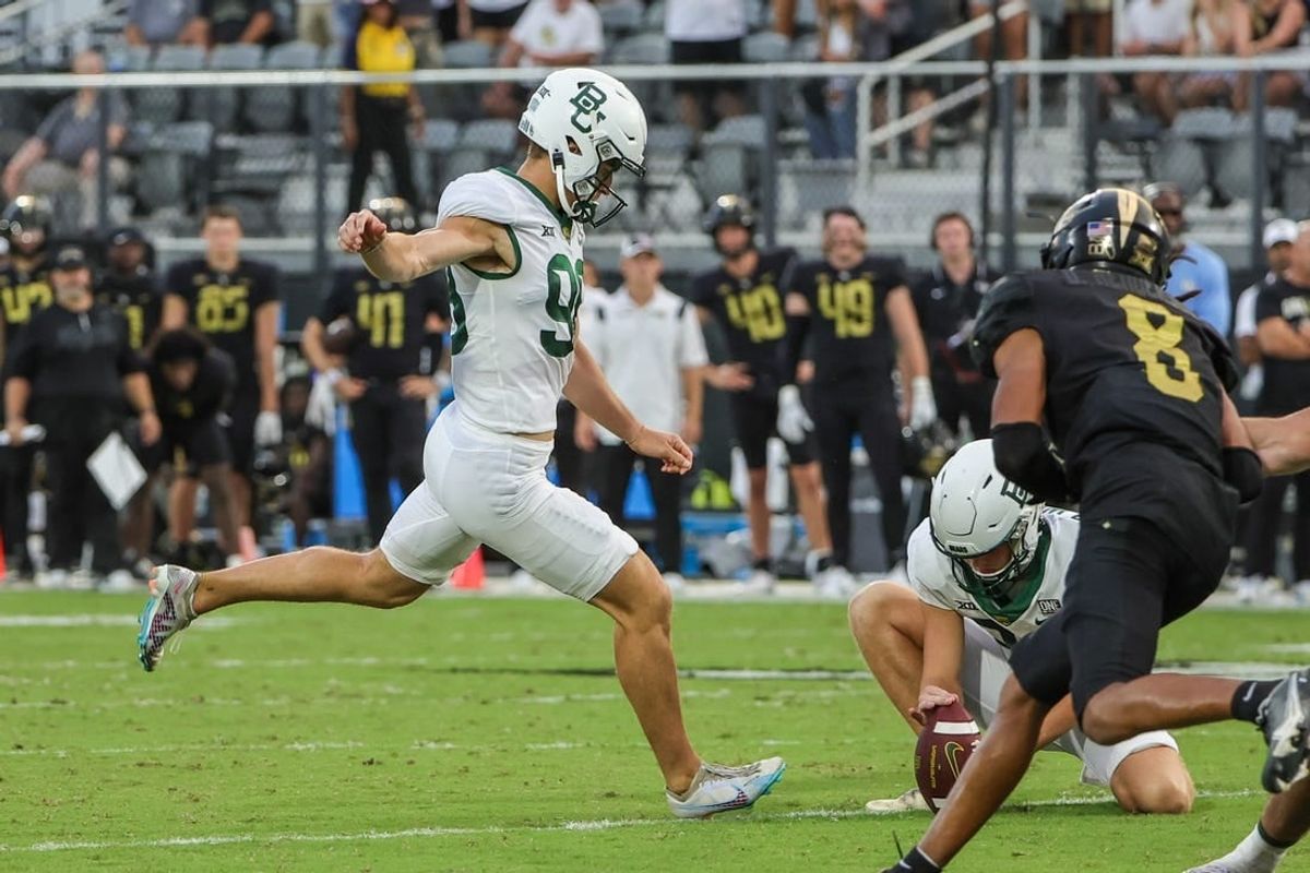 Sep 30, 2023; Orlando, Florida, USA; Baylor Bears kicker Isaiah Hankins (98) kicks a field goal to take the lead 36-35 during the fourth quarter at FBC Mortgage Stadium.