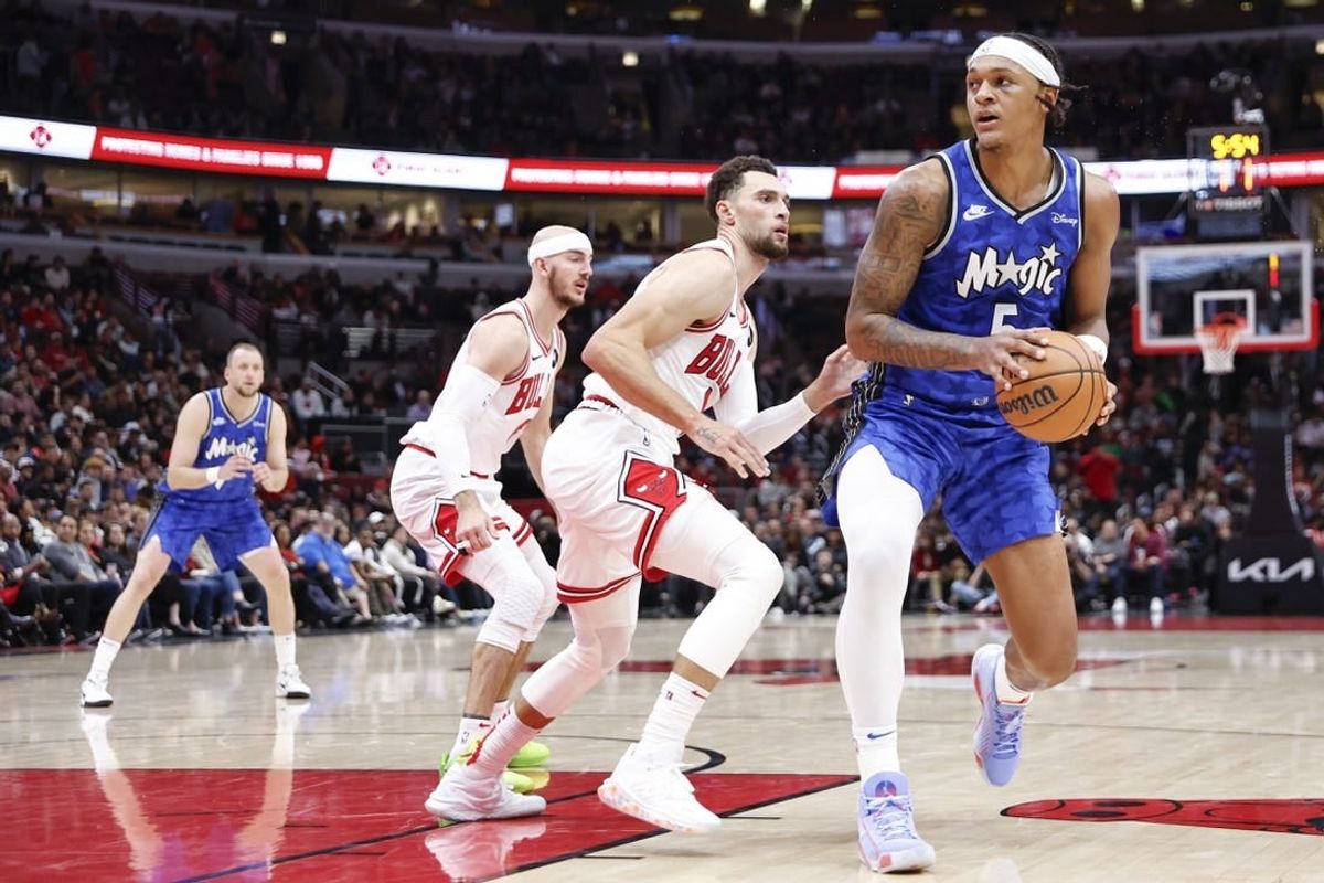 Nov 15, 2023; Chicago, Illinois, USA; Orlando Magic forward Paolo Banchero (5) looks to shoot against Chicago Bulls guard Zach LaVine (8) during the second half at United Center.
