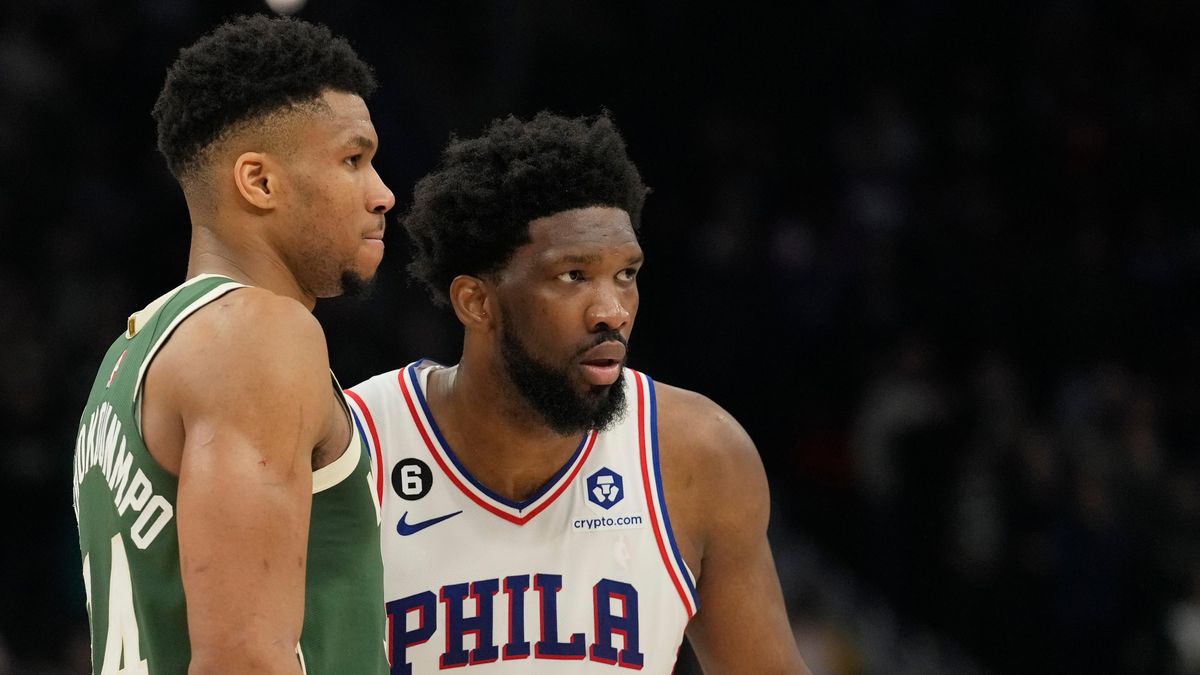 Giannis Antetokounmpo of the Milwaukee Bucks and Joel Embiid of the Philadelphia 76ers  in the second half of the game at Fiserv Forum on March 04, 2023 in Milwaukee, Wisconsin.