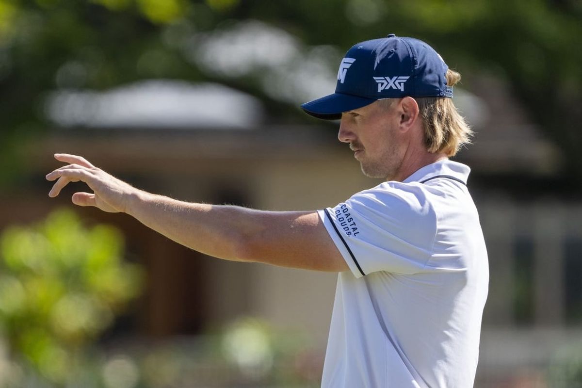 January 13, 2024; Honolulu, Hawaii, USA; Jake Knapp lines up his putt on the first hole during the third round of the Sony Open in Hawaii golf tournament at Waialae Country Club.