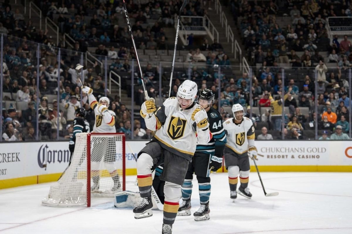 Feb 19, 2024; San Jose, California, USA; Vegas Golden Knights left wing Mason Morelli (11) celebrates after the goal San Jose Sharks during the first period at SAP Center at San Jose.