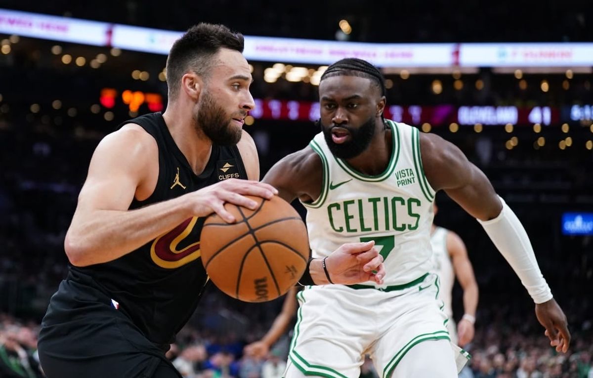 May 9, 2024; Boston, Massachusetts, USA; Cleveland Cavaliers guard Max Strus (1) drives the ball against Boston Celtics guard Jaylen Brown (7) in the second quarter during game two of the second round for the 2024 NBA playoffs at TD Garden.