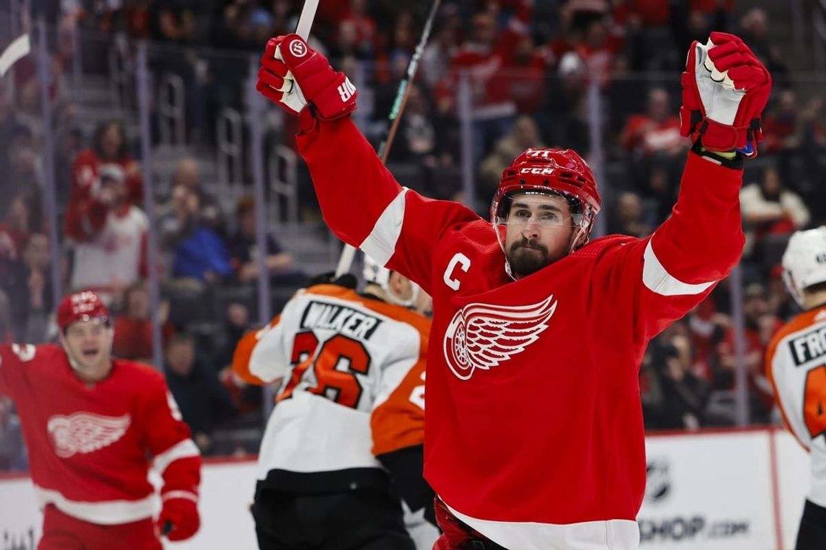 Jan 25, 2024; Detroit, Michigan, USA;  Detroit Red Wings center Dylan Larkin (71) celebrates after he score a goal in the second period against the Philadelphia Flyers at Little Caesars Arena.