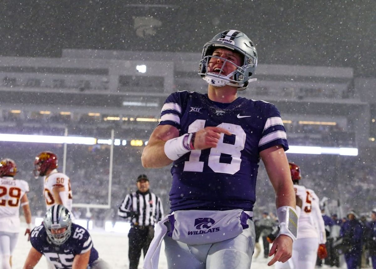 Nov 25, 2023; Manhattan, Kansas, USA; Kansas State Wildcats quarterback Will Howard (18) celebrates a touchdown in the third quarter against the Iowa State Cyclones at Bill Snyder Family Football Stadium.
