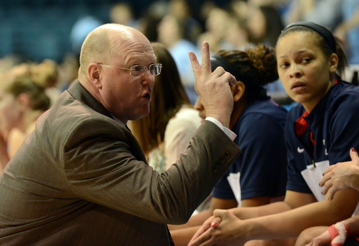 Mar 21, 2015; Chapel Hill, NC, USA; Liberty Flames head coach Carey Green talks to his players during the first half against the North Carolina Tar Heels in the first round of the NCAA Women's tournament at Carmichael Arena. Mandatory Credit: Rob Kinnan-Imagn Images