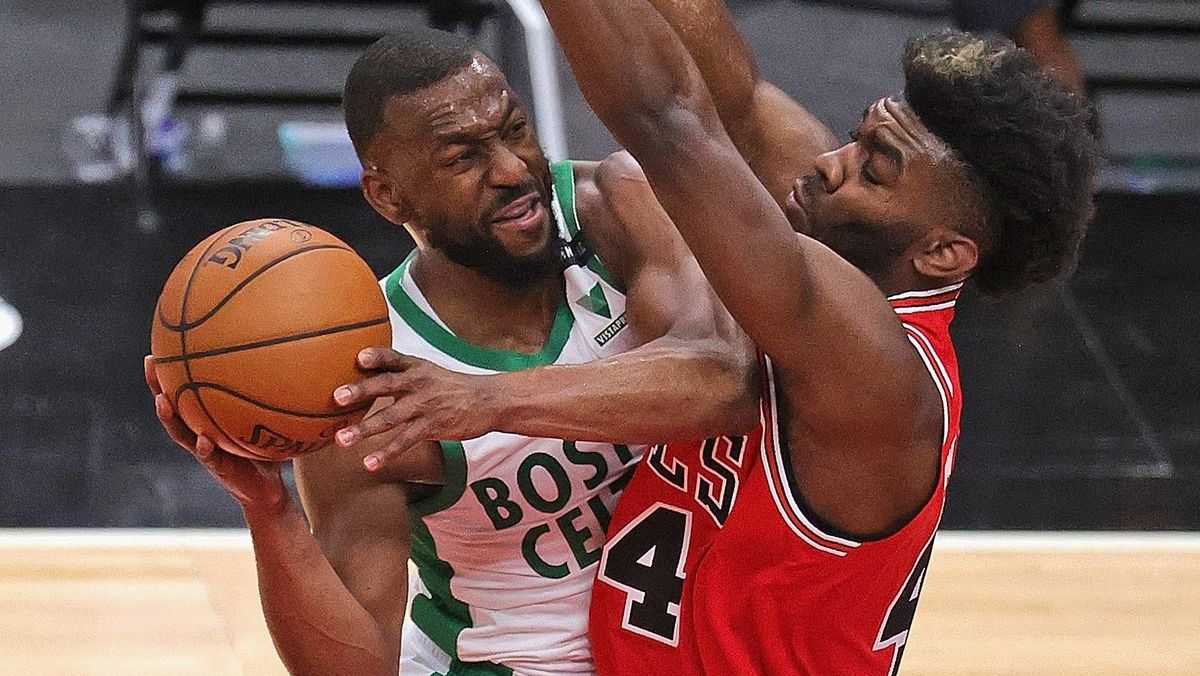 Boston’s Kemba  Walker  tries  to  get  off  a  shot  against  Patrick  Williams  Bulls  at  the  United  Center  on  May  07,  2021.