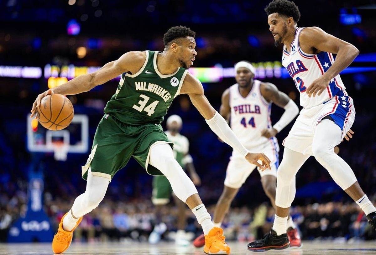 Feb 25, 2024; Philadelphia, Pennsylvania, USA; Milwaukee Bucks forward Giannis Antetokounmpo (34) controls the ball against Philadelphia 76ers forward Tobias Harris (12) during the second quarter at Wells Fargo Center.