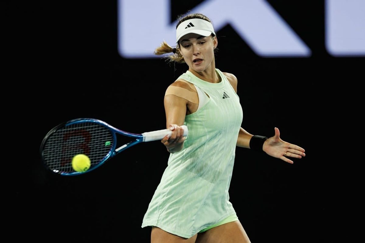 Jan 24, 2024; Melbourne, Victoria, Australia;  Anna Kalinskaya of Russia in action during her match against Qinwen Zheng of China in the quarter final of the women   s singles at the Australian Open.
