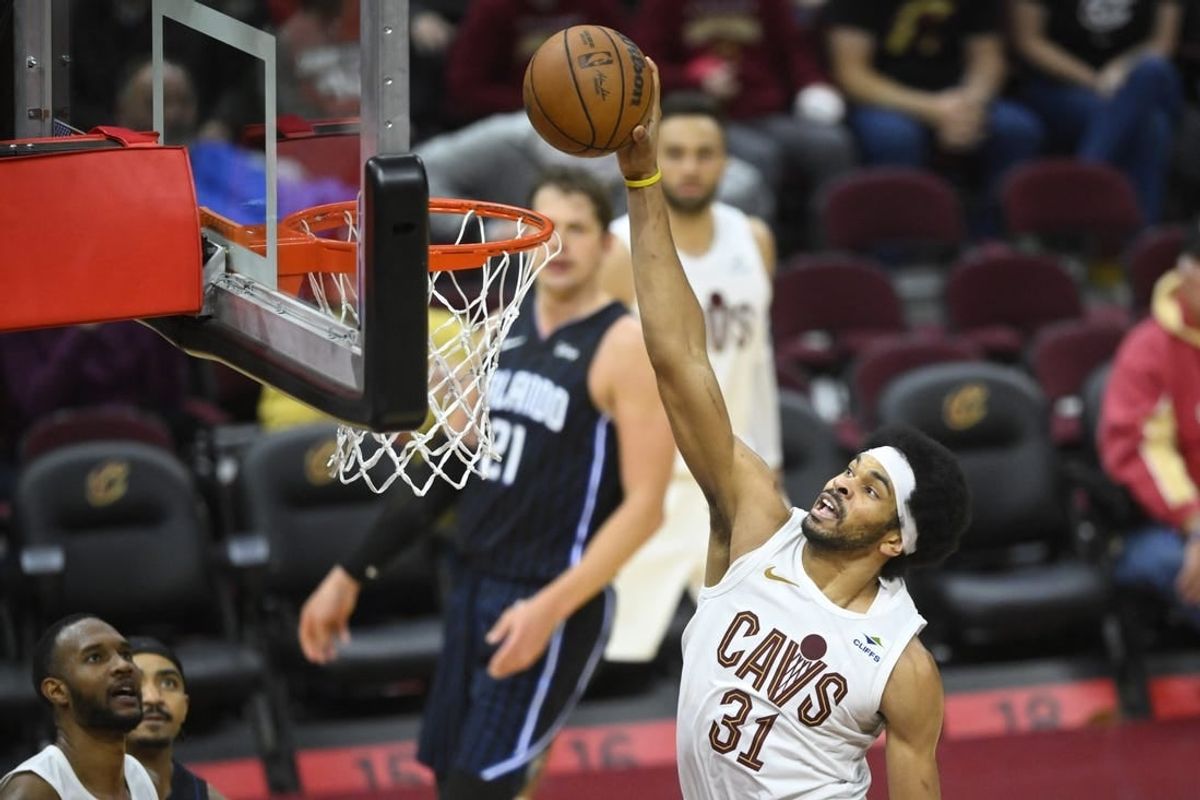 Feb 22, 2024; Cleveland, Ohio, USA; Cleveland Cavaliers center Jarrett Allen (31) dunks in the fourth quarter against the Orlando Magic at Rocket Mortgage FieldHouse.