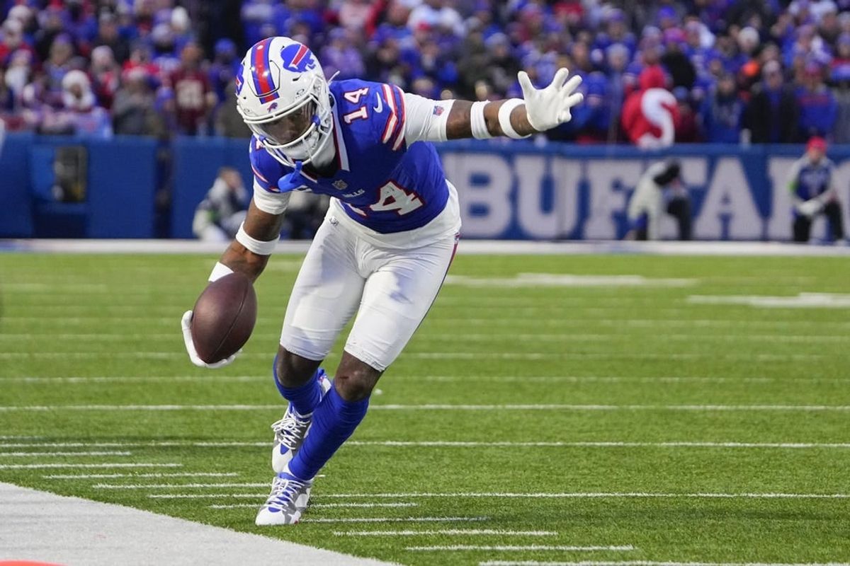 Dec 31, 2023; Orchard Park, New York, USA; Buffalo Bills wide receiver Stefon Diggs (14) runs with the ball along the sidelines after making a catch against the New England Patriots during the second half at Highmark Stadium.