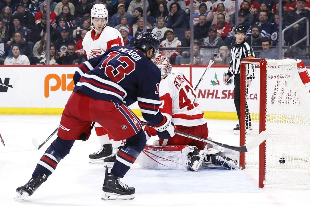 Dec 20, 2023; Winnipeg, Manitoba, CAN; Winnipeg Jets center Gabriel Vilardi (13) scores on Detroit Red Wings goaltender James Reimer (47) in the second period at Canada Life Centre.