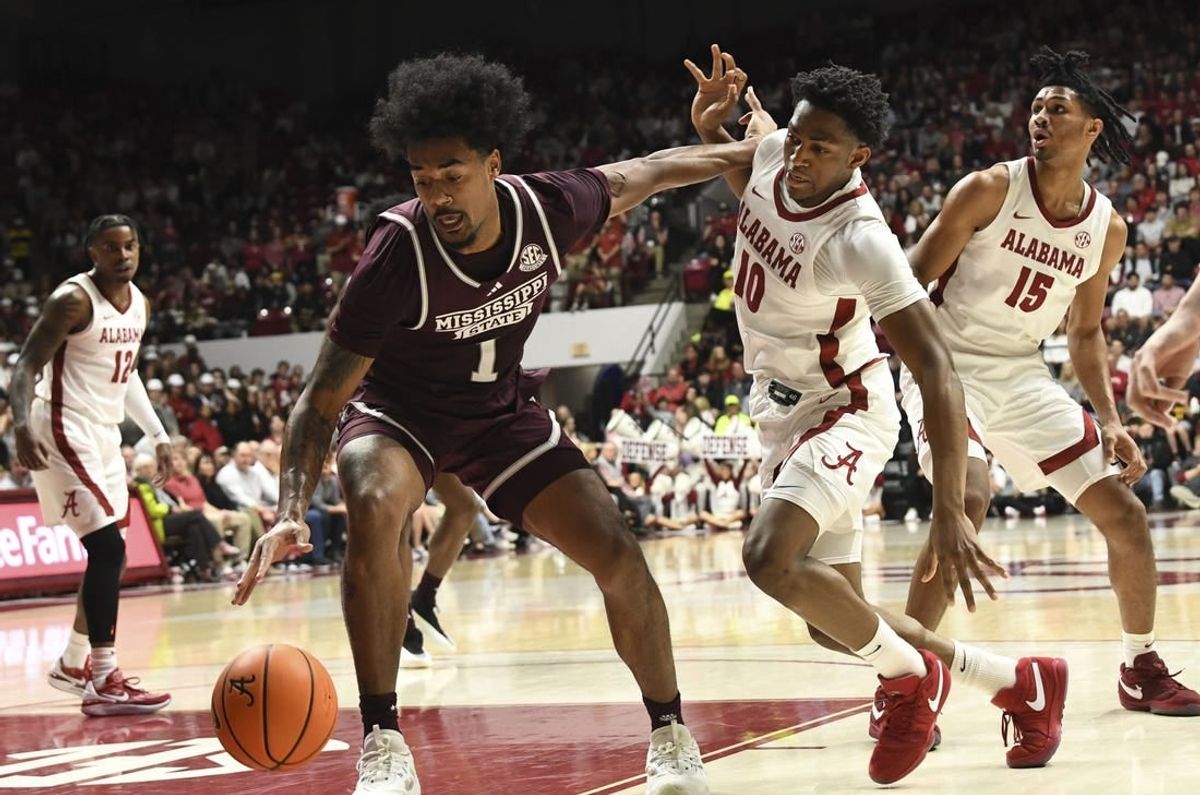 Feb 3, 2024; Tuscaloosa, Alabama, USA;  Mississippi State forward Tolu Smith III (1) pushes away Alabama forward Mouhamed Dioubate (10) as he makes a move to the basket at Coleman Coliseum.