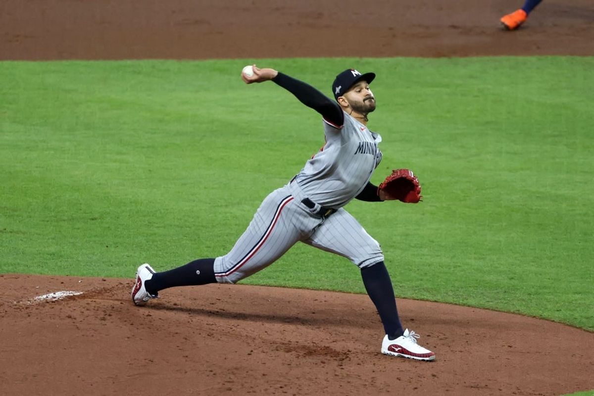 Oct 8, 2023; Houston, Texas, USA; Minnesota Twins starting pitcher Pablo Lopez (49) throws a pitch against the Houston Astros in the first inning for game two of the ALDS for the 2023 MLB playoffs at Minute Maid Park.